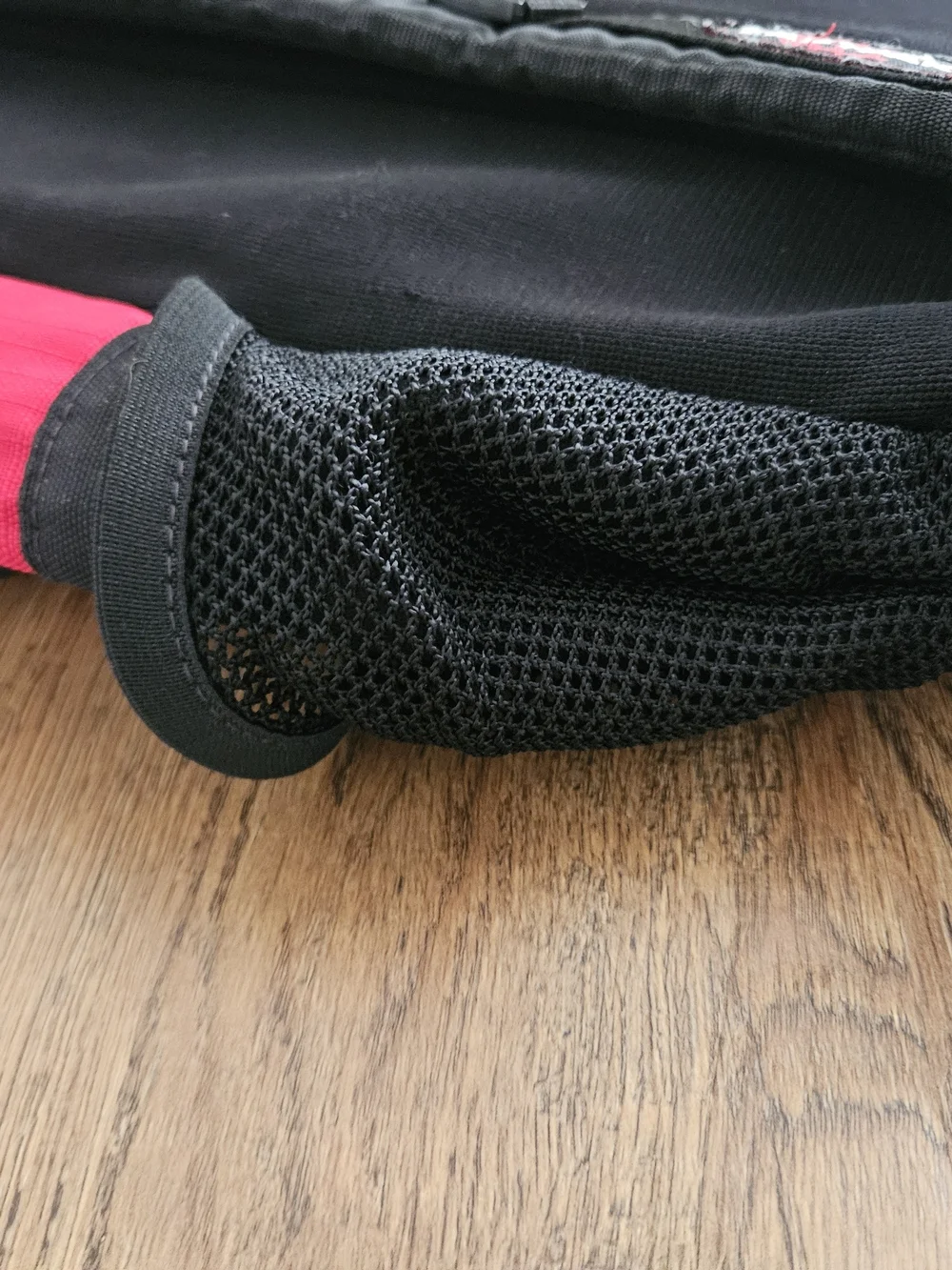 Eastpak Red and Black Backpack with Multiple Compartments